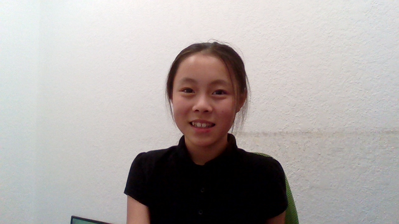 Vicky smiling at the camera